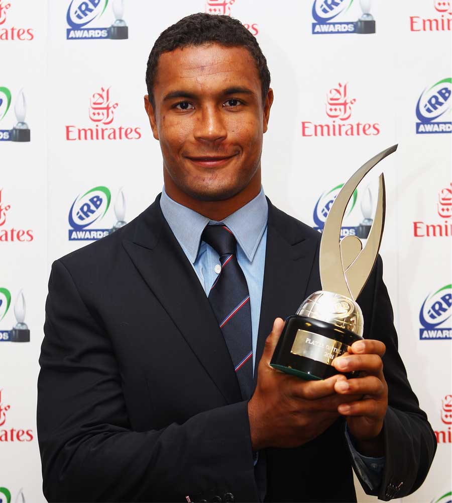 France captain Thierry Dusautoir lifts the IRB Player of the Year award