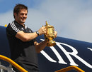 Richie McCaw shows off the World Cup