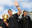 Dan Carter carries the World Cup on the parade through Christchurch