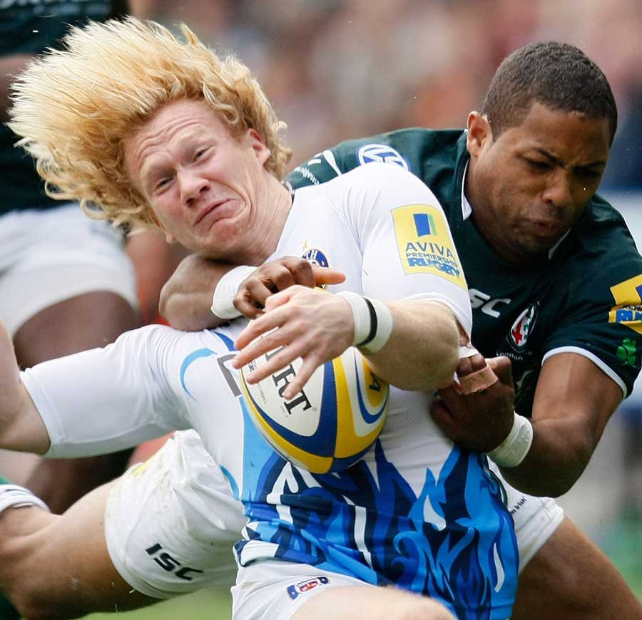 Bath's Tom Biggs feels the force of Delon Armitage's high tackle