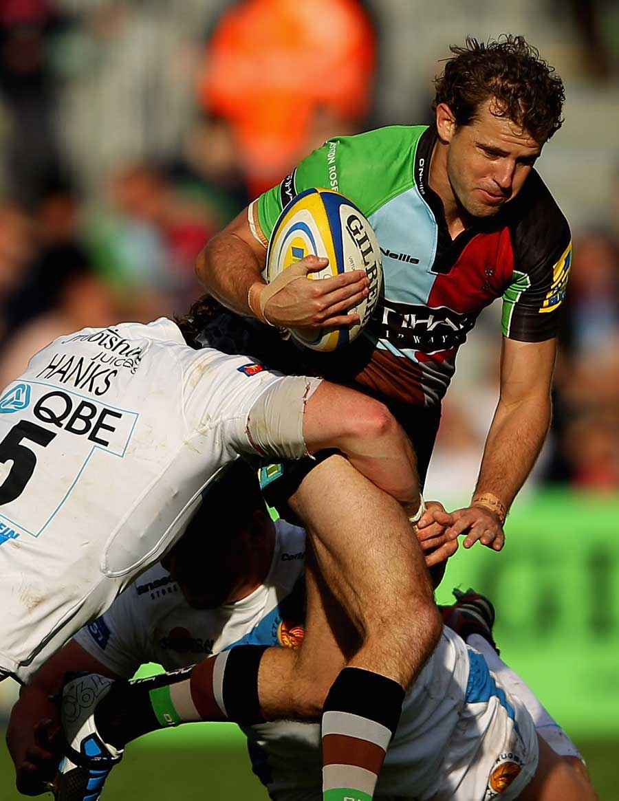 Harlequins' Nick Evans tries to force his way through