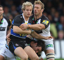 Bath's Nick Abendanon is surrounded by Quins defenders