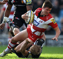 Gloucester's Freddie Burns stretches for the tryline