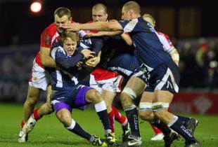 Mathew Tait of Sale is tackled by Chris Latham of Worcester during the Guinness Premiership match between Sale Sharks and Worcester Warriors at Edgeley Park in Stockport, England on November 14, 2008. 
