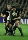 Mils Muliaina attempts to break clear of the Ireland defence