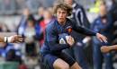 France's Maxime Medard looks to avoid a tackler