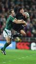 Mils Muliaina goes for a high-ball