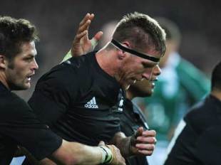 Brad Thorn of the All Blacks is congratulated by John Afoa and Richie McCaw after scoring a try during the Guinness Series match between Ireland and New Zealand at Croke Park on November 15, 2008 in Dublin, Ireland. 