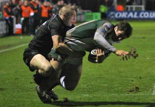 Declan Danaher of London Irish scores a try while being tackled by Steve Jones of Newcastle during the Guinness Premiership match between Newcastle Falcons and London Irish at Kingston Park in Newcastle, England on November 16, 2008. 