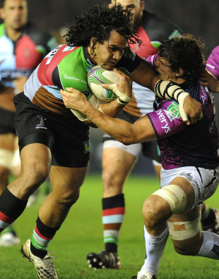 Harlequins' Maurie Fa'asavalu fends off Connacht's Mike McCarthy