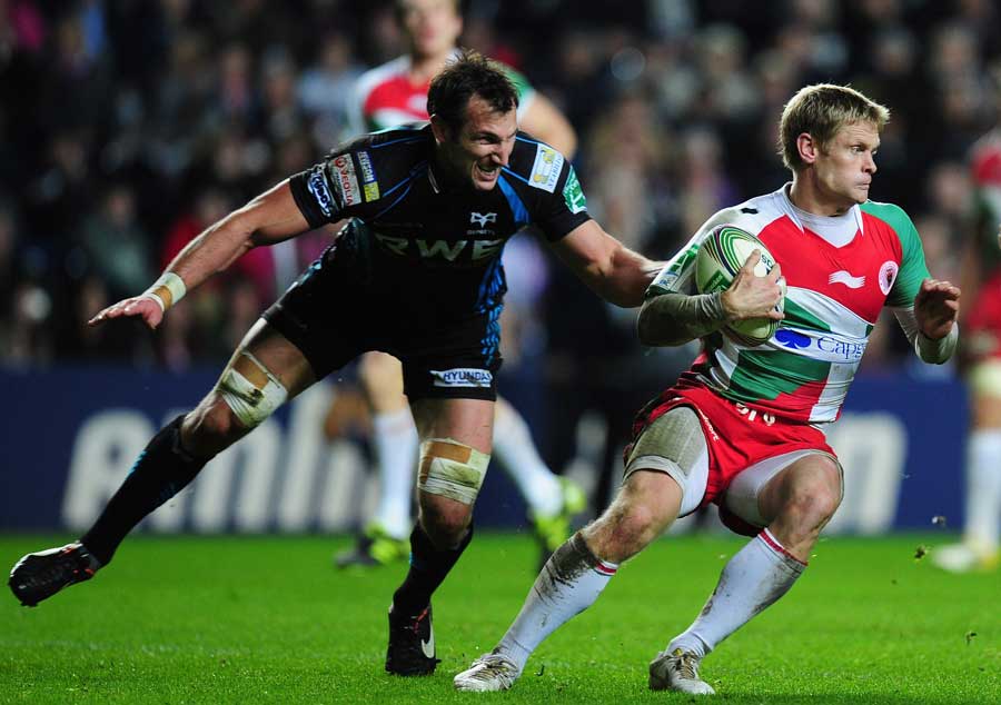 Biarritz's Iain Balshaw tries to make a break during their clash with the Ospreys