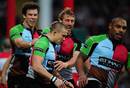 Harlequins' Mike Brown is congratulated on his early try