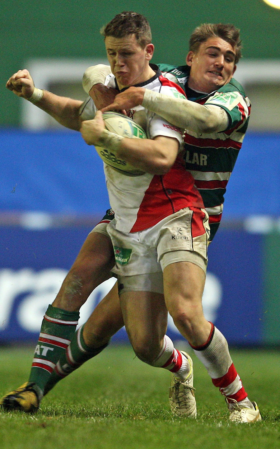 Leicester's Toby Flood tackles Ulster's Craig Gilroy