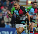 Harlequins' Mike Brown celebrates touching down for a try