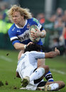 Bath's Tom Biggs is caught by the Montpellier defence