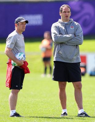 Brian Smith, the England attack coach, talks to Martin Johnson, Takapuna, New Zealand, October 7, 2011