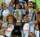 Fiji lift the trophy after beating New Zealand in the final of the Gold Coast Sevens