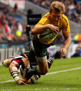 Wallabies wing Lachie Turner scores in the corner