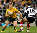 Wallabies fly-half James O'Connor takes on Danny Cipriani
