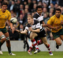 Barbarians wing Sam Tomkins releases the ball