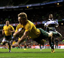 Wallabies winger Lachie Turner scores his second try