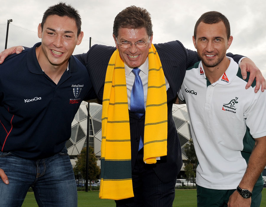 Australia's Quade Cooper and Wales' Gareth Delve pack down with Victorian Premier Ted Baillieu