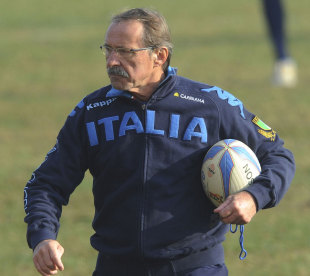 New Italy head coach Jacques Brunel watches over training, Parma, Italy, November 28, 2011