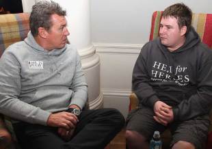 John Kirwan talks to injured serviceman Paul Bennett prior to Saturday's Rugby Heroes match, Tidworth, Wilshere, November 30, 2011