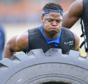 Chiliboy Ralepelle of the Bulls tries to shift a tyre during a gruelling pre-season session, Loftus Versveld, Pretoria, South Africa, November 30, 2011