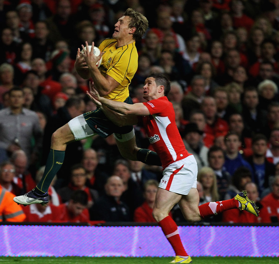 Australia's Lachie Turner takes the ball ahead of Wales' Shane Williams