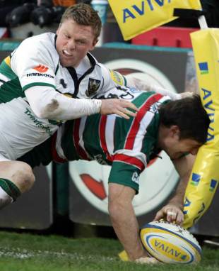 Leicester Tigers' Matt Smith grounds the ball under pressure from Chris Ashton, Leicester Tigers v Northampton Saints, Aviva Premiership, Welford Road, Leicester, England, December 3, 2011