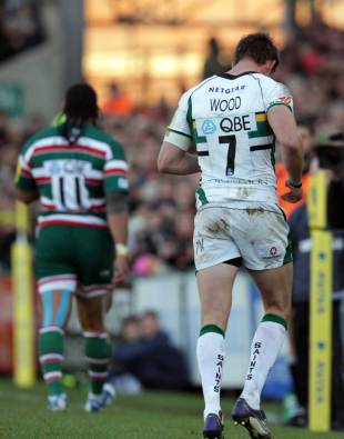 Saints' Tom Wood and Tigers' Alesana Tuilagi depart from the field after being issued with red cards