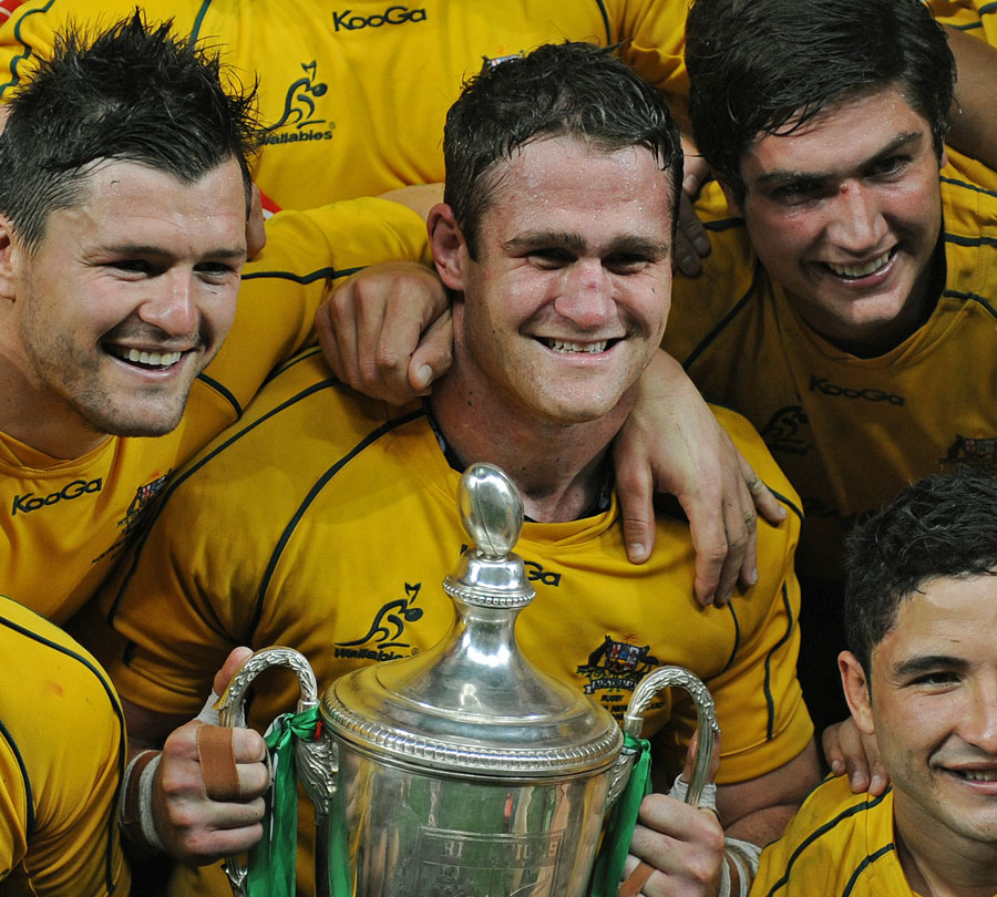 The Wallabies celebrate with the Tri-Nations trophy