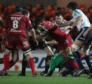 Referee Romain Poite unwittingly gets caught up in the action