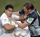 Glasgow's Al Kellock gets to grips with Montpellier's Alex Tulou
