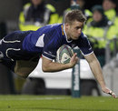 Leinster Luke Fitzgerald dives in to score one of his two tries against Bath