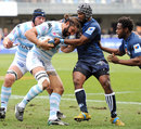 Racing Metro's Sebastien Chabal is wrapped up