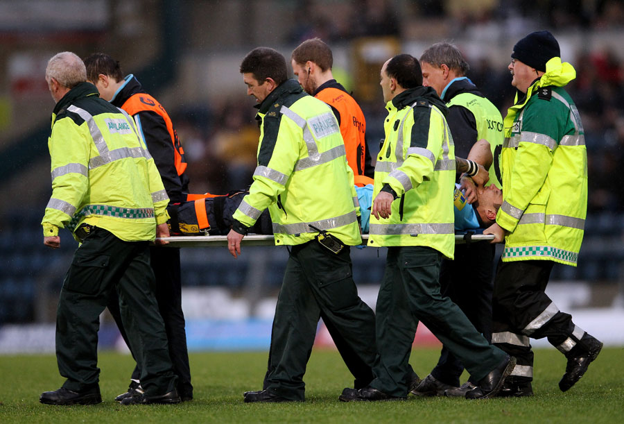 Worcester's Ezra Taylor is stretchered from the field