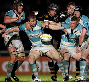 orcester's Matt Kvesic tries to shield the ball, London Wasps v Worcester Warriors, Aviva Premiership, Adams Park, Wycombe, England, January 1, 2012