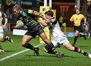 Northampton's Roger Wilson closes in on a try