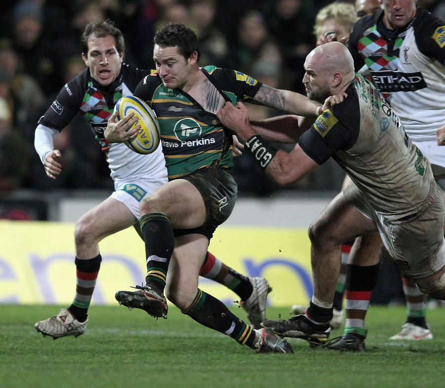 Northampton's Ryan Lamb stretches the Quins defence