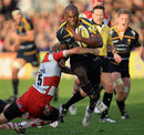 Worcester's Miles Benjamin is cut down by Gloucester's Olly Morgan