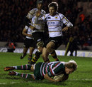 Leicester's Billy Twelvetrees crashes over to score