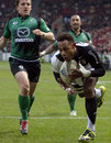 Toulouse's  Timoci Matanavou dives in to score