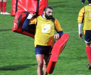 France's rugby union national team player Sebastien Chabal leaves the field after a training session in Marcoussis, south of Paris, four days ahead of the France-Australia match-test at the Stade de France in Saint-Denis, north of Paris. November 18, 2008 .