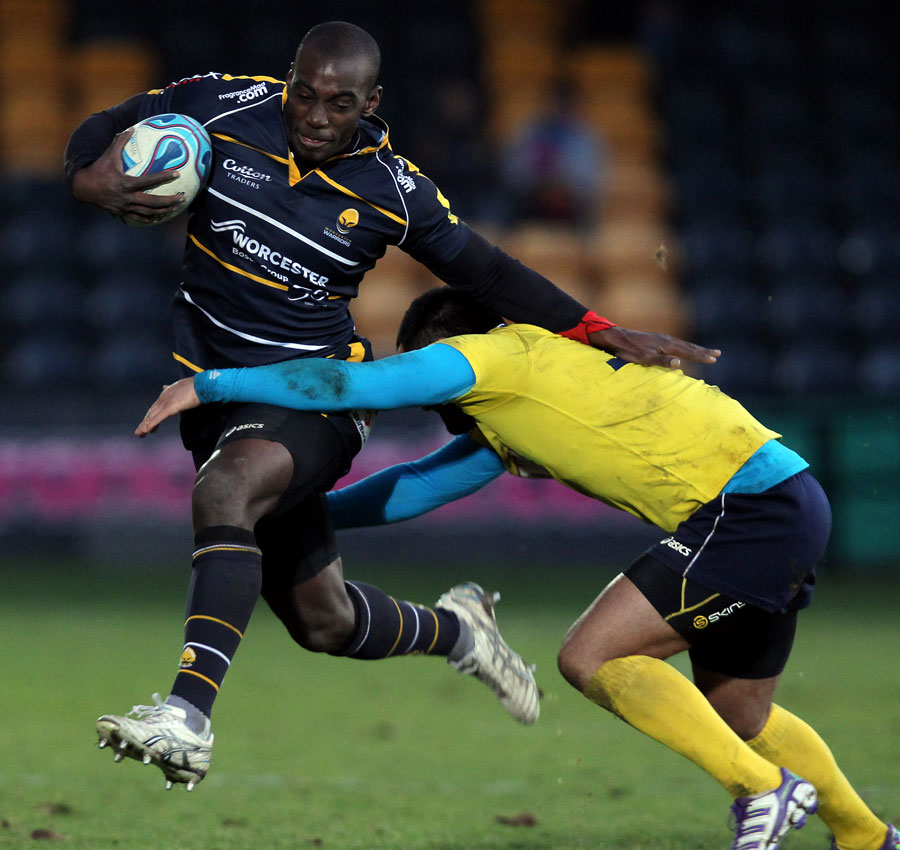 Worcester's Miles Benjamin tries to break out of a tackle