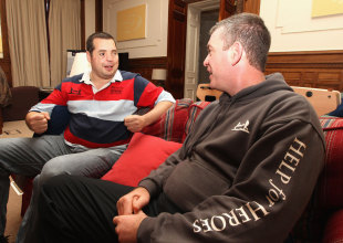 Corporal Simon Brown talks to Dean Ryan, Heroes Rugby Challenge open day, Tedworth House, Tidworth, Wiltshire, November 29, 2011