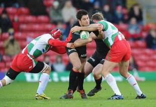 Saracens centre Brad Barritt is swallowed up by the Biarritz defence