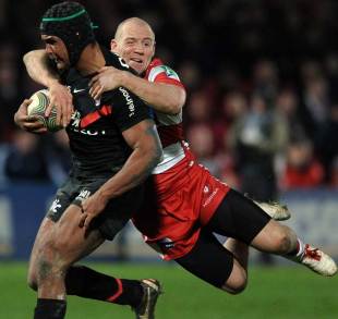 Gloucester's Mike Tindall clings on to Thierry Dusautoir, Gloucester v Toulouse, Heineken Cup, Kingsholm, Gloucester, January 20, 2012