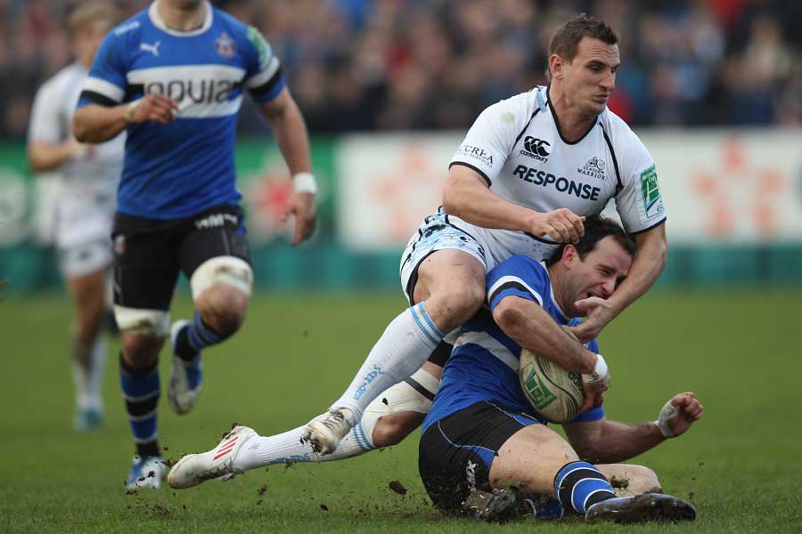 Bath's Matt Carraro is smothered by Glasgow's Colin Shaw